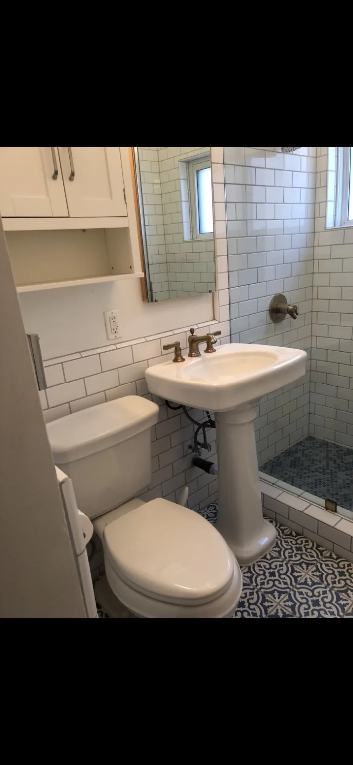 Pedestal sink and tiled bathroom project